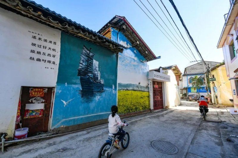 昆明小漁村相關報道：尋跡昆明旅居地丨旅居在滇池邊的小漁村