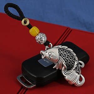 金龍魚汽車鑰匙扣掛件是一種流行的裝飾品，適合大眾購買：金龍魚汽車鑰匙扣掛件價格