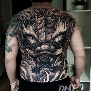 紋身龍頭魚尾的含義和寓意是什么？：紋身龍頭魚尾的含義