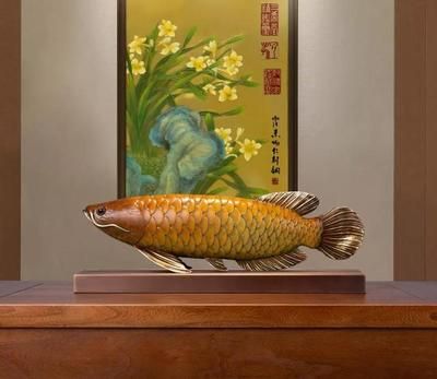 玄關(guān)擺金龍魚好嗎（中式玄關(guān)中擺放金龍魚有很多好處但也要結(jié)合個人的實(shí)際情況）