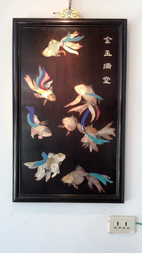 許廣彤的水墨金龍魚作品有哪些創新？