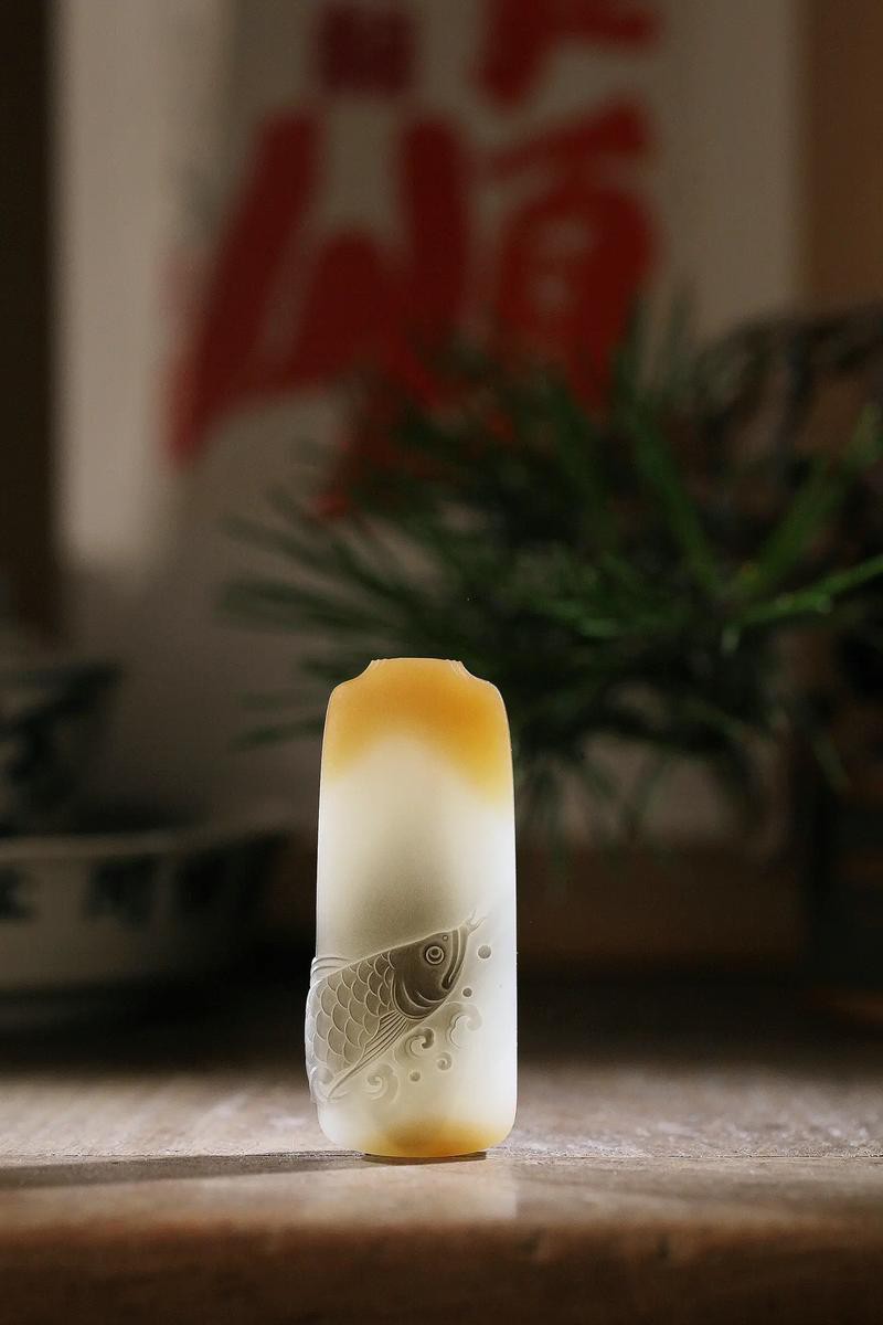 推薦一些專業的金龍魚雕刻大師作品