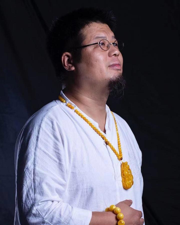 推薦一些專業的金龍魚雕刻大師作品