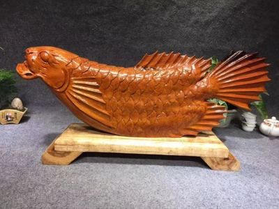 金龍魚雕刻，金龍魚雕刻在中國文化中有什么特殊的象征意義和象征意義？