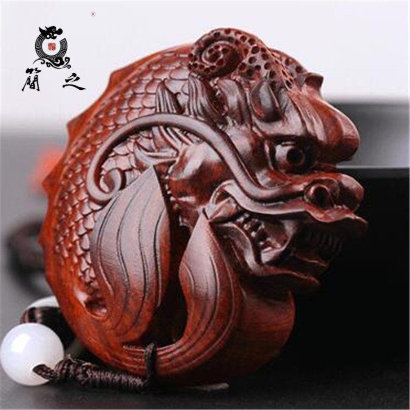 龍手把件寓意
